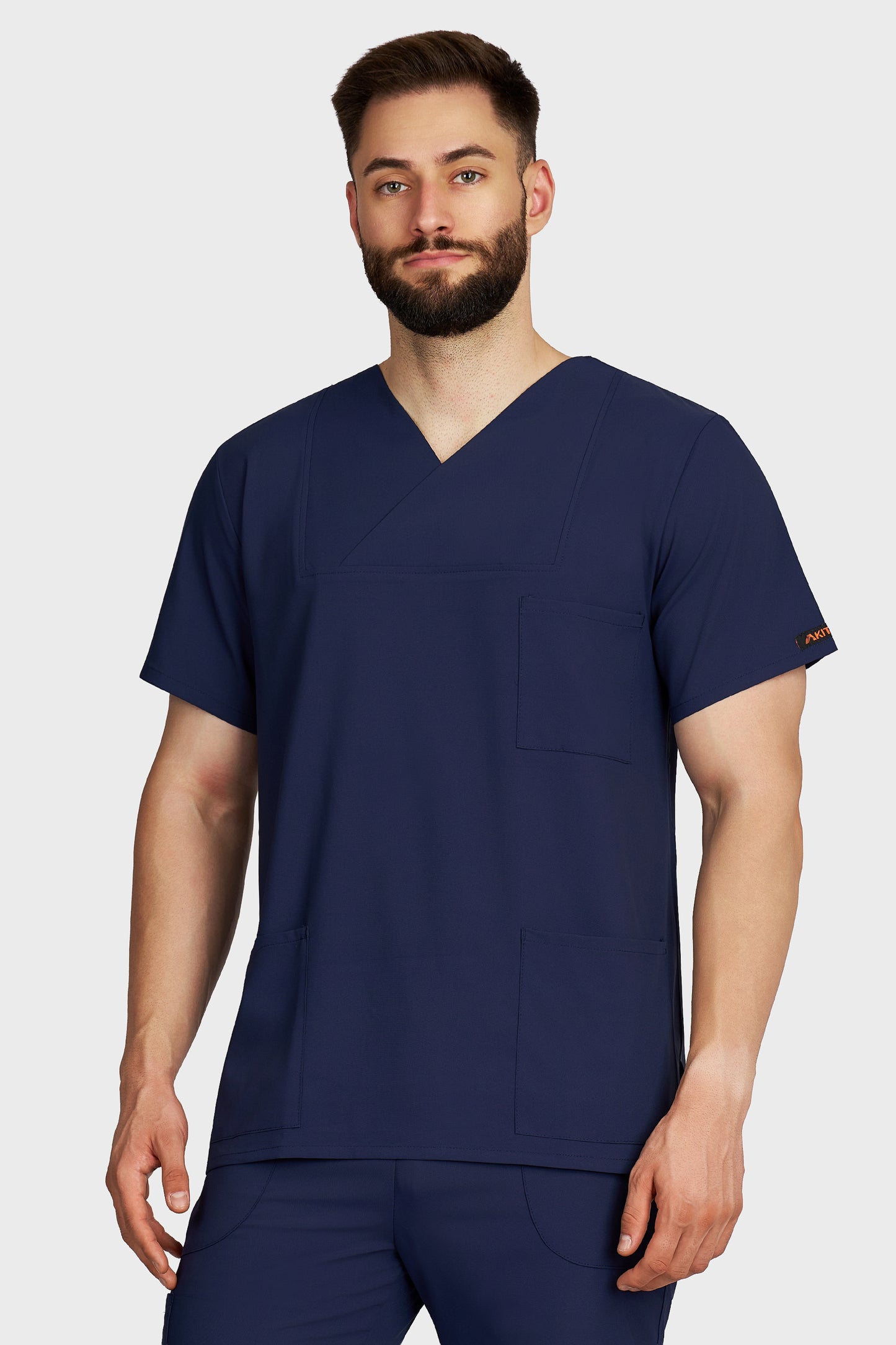 Bluza medicala barbati Victoria bleumarin stretch - vedere din fata - AKITEX