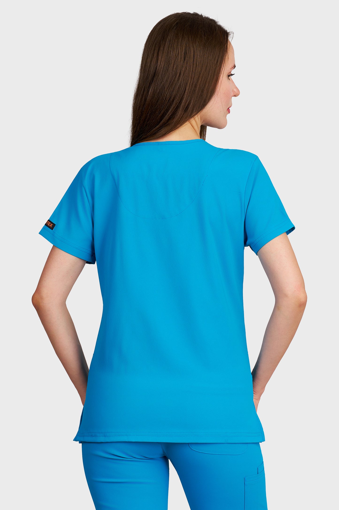 Bluza medicala femei Tosca turcoaz stretch - vedere din spate - AKITEX
