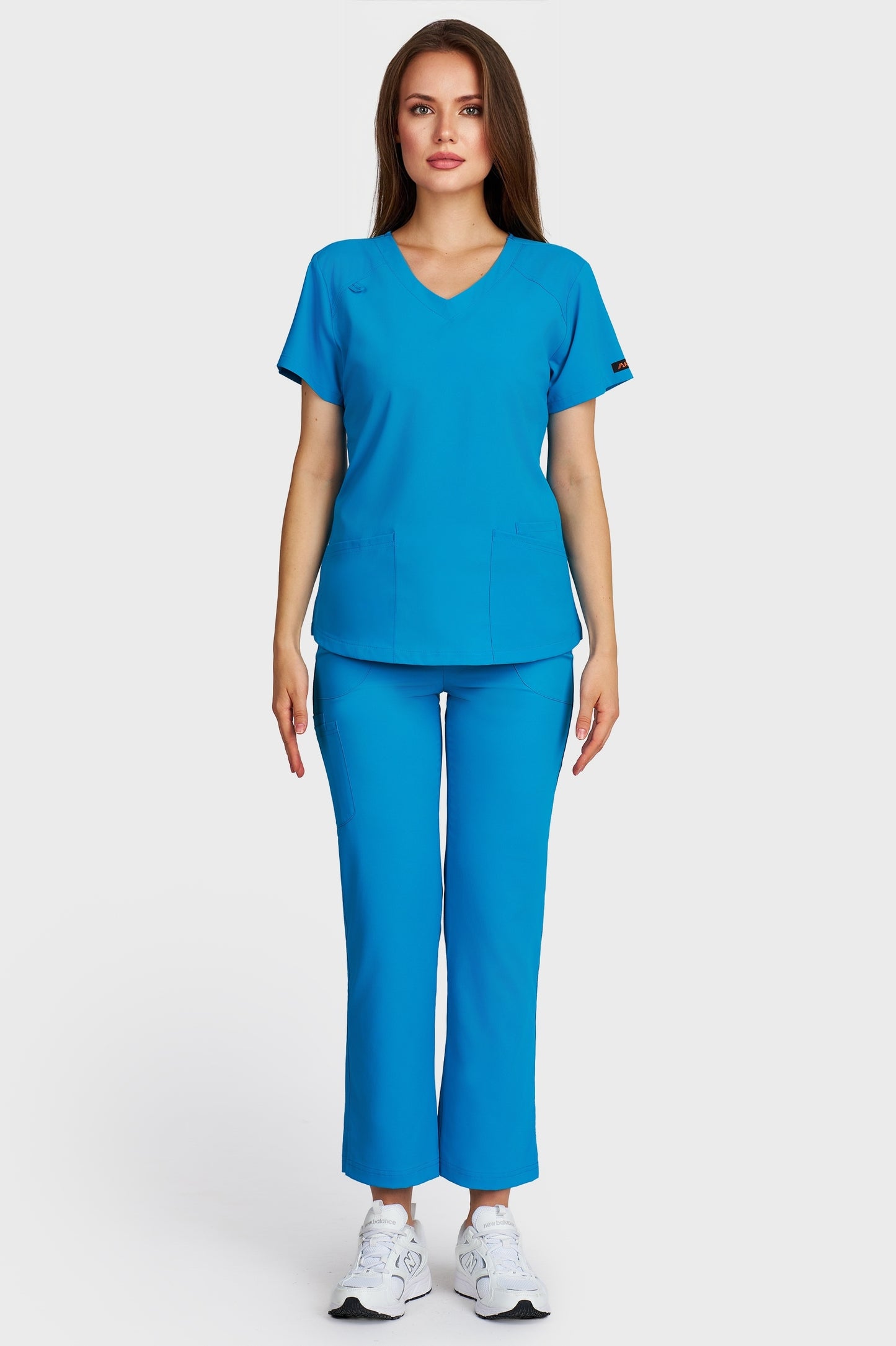 Costum medical femei turquoise - bluza medicala Carmen si pantaloni Violeta, vedere din fata - AKITEX