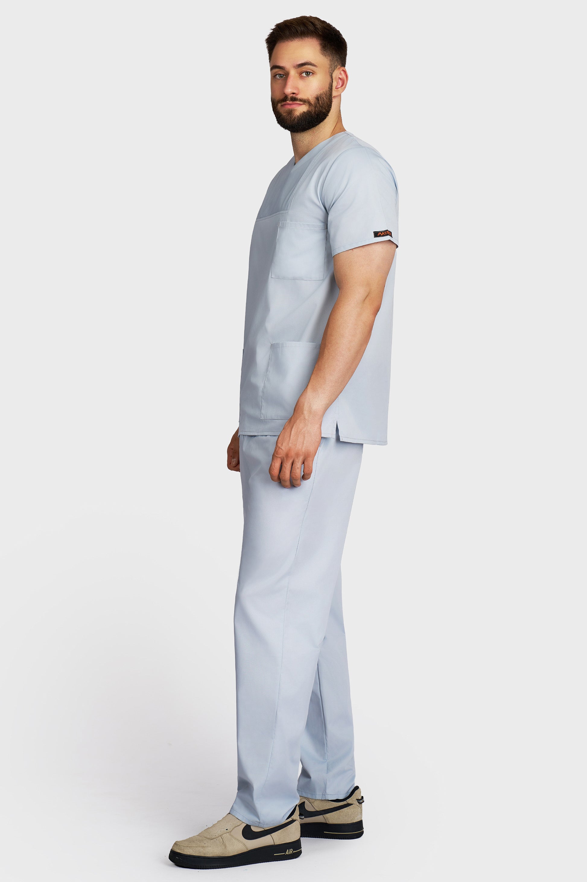 Costum medical barbati gri - bluza medicala Victoria si pantaloni cu elastic si snur, vedere laterala - AKITEX